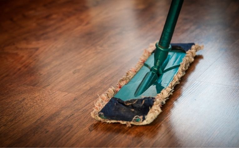 Mop Showing Water Resistant Hardwood Flooring